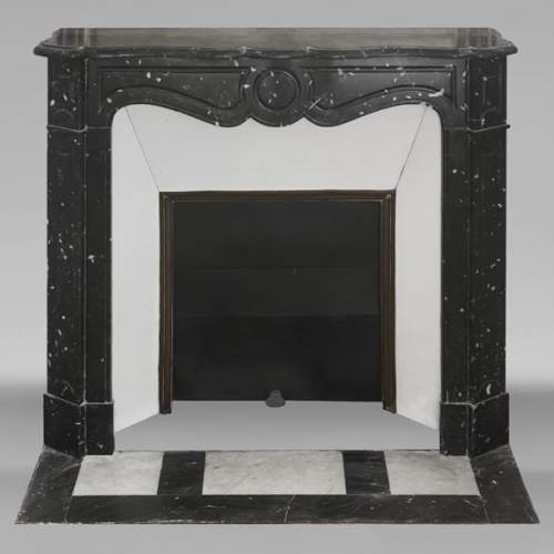 Louis XV style fireplace, Pompadour model, in speckled black marble