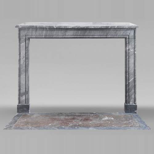 Louis XVI period fireplace in blue turquin marble, with molding decoration