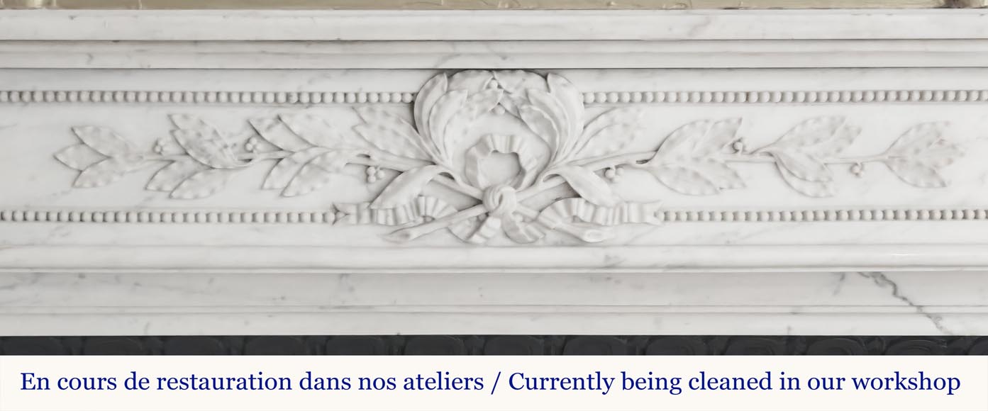 Curved Louis XVI style fireplace with beaded decoration, in semi-statuary marble. Curved Louis XVI style fireplace with beaded decoration, in semi-statuary marble.-1