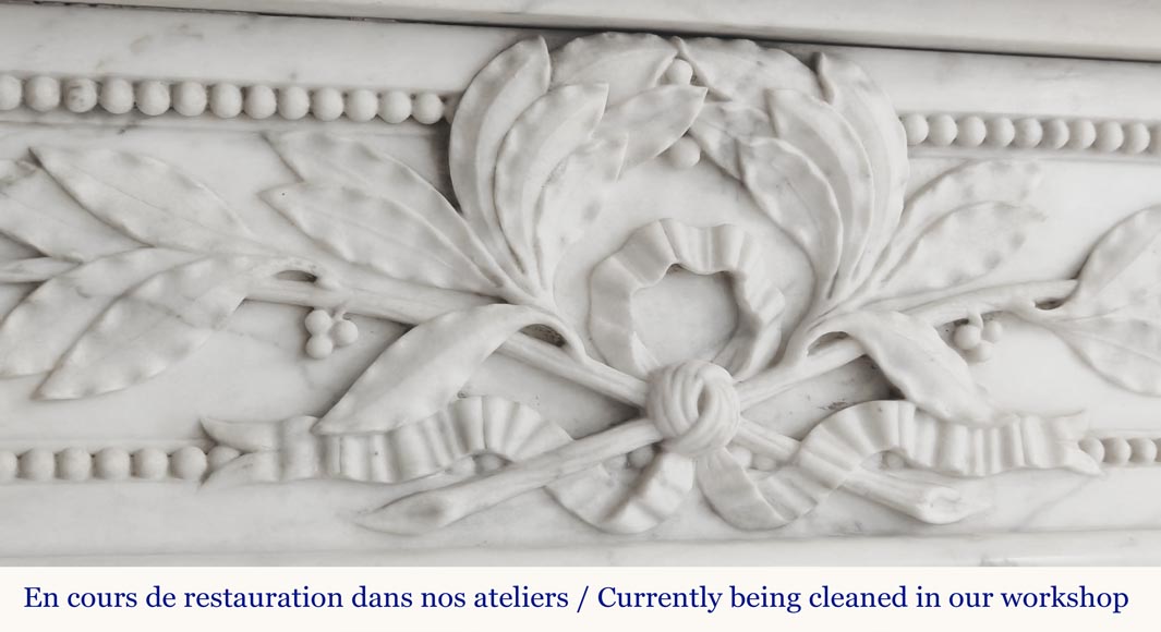 Curved Louis XVI style fireplace with beaded decoration, in semi-statuary marble. Curved Louis XVI style fireplace with beaded decoration, in semi-statuary marble.-2