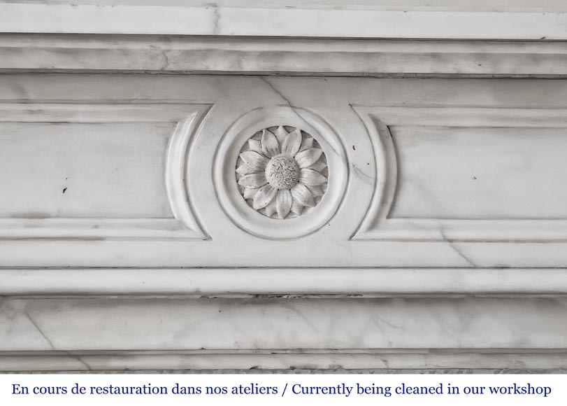 Louis XVI style fireplace in semi-statuary marble, decorated with a sunflower Louis XVI style fireplace in semi-statuary marble, decorated with a sunflower-1