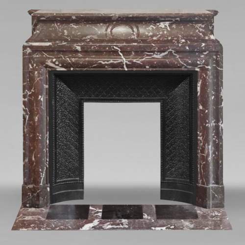 Louis XIV style fireplace with acroterion, in Northern Red marble