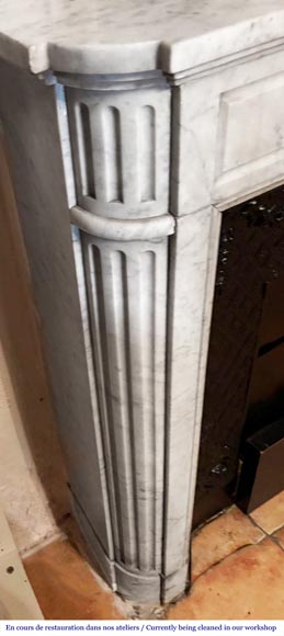 Louis XVI style fireplace with rounded corners, decorated with a daisy, in Carrara marble-3