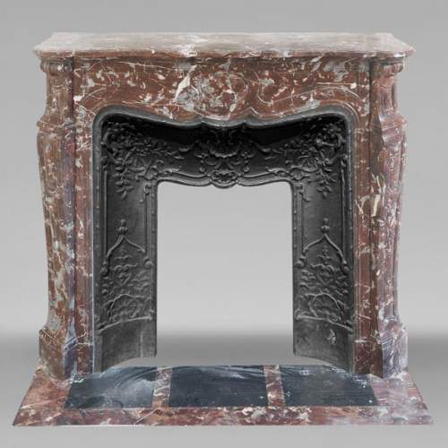 Louis XV style Pompadour model fireplace, in red northern marble