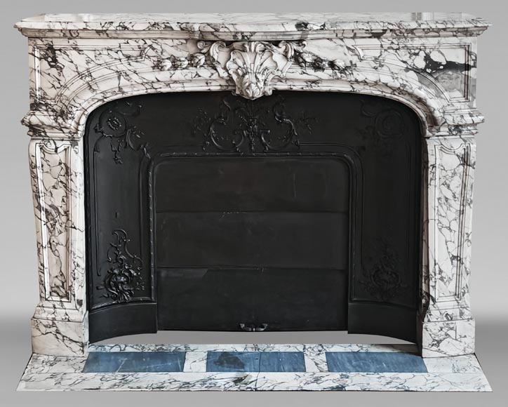 Important Regency-style fireplace adorned with a shell motif, in purple breccia marble-0