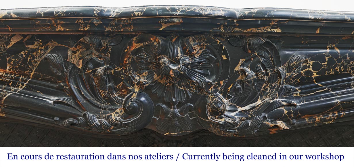 Louis XV style fireplace in richly sculpted Portoro marble Louis XV style fireplace in richly sculpted Portoro marble-1