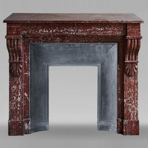 Napoleon III style fireplace with modillion type in red Campan marble