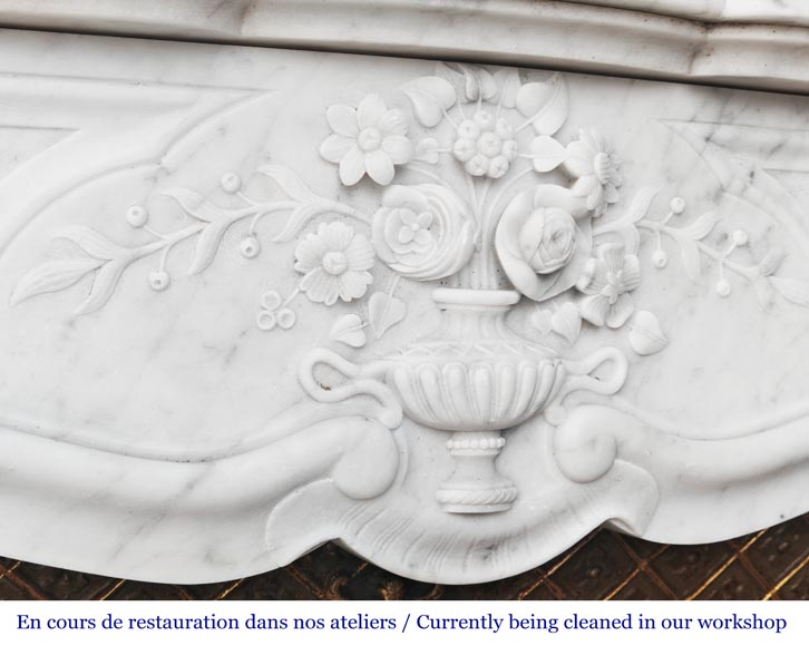 Louis XV style fireplace in Carrara marble, decorated with a vase of flowers Louis XV style fireplace in Carrara marble, decorated with a vase of flowers-2