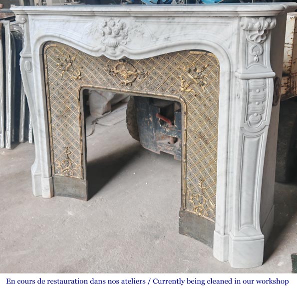 Louis XV style fireplace in Carrara marble, decorated with a vase of flowers Louis XV style fireplace in Carrara marble, decorated with a vase of flowers-9