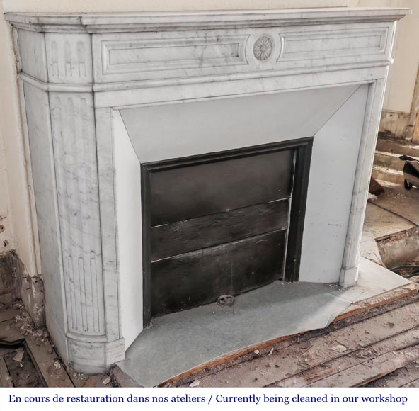 Louis XVI style fireplace with rounded corners and sunflower motif, in Carrara marble-2