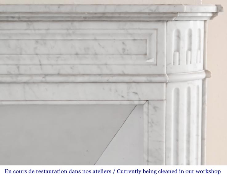 Louis XVI style fireplace with rounded corners and sunflower motif, in Carrara marble-6