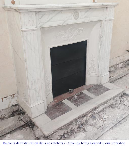 Louis XVI style fireplace in semi-statuary marble, decorated with a sunflower Louis XVI style fireplace in semi-statuary marble, decorated with a sunflower-2