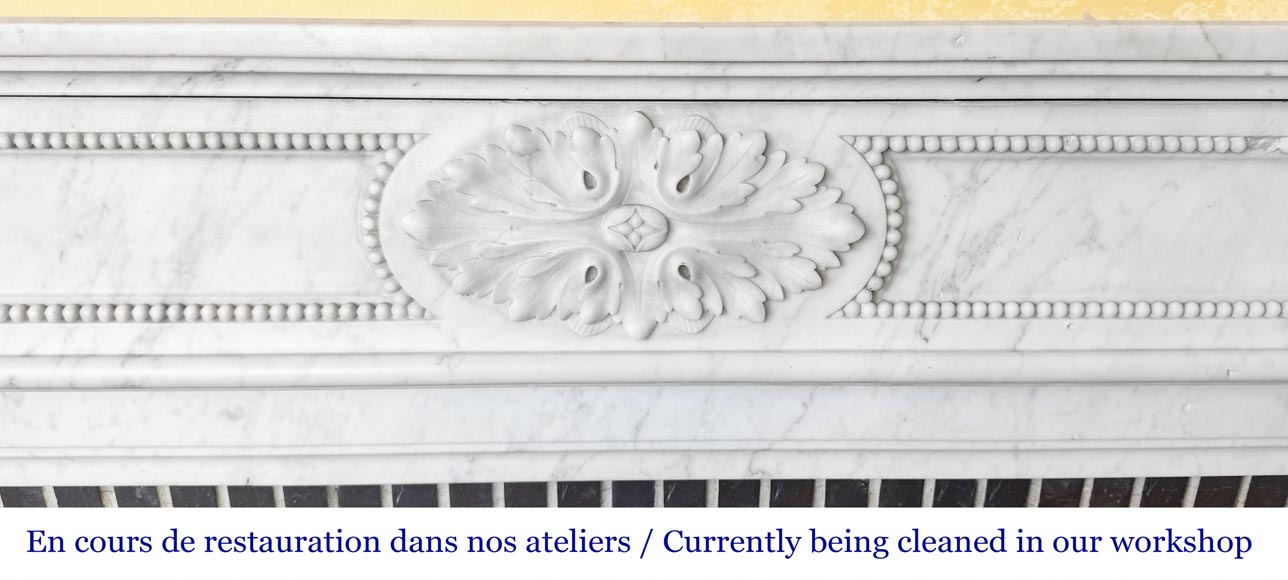 Louis XVI style fireplace in Carrara marble decorated with pearls Louis XVI style fireplace in Carrara marble decorated with pearls-1