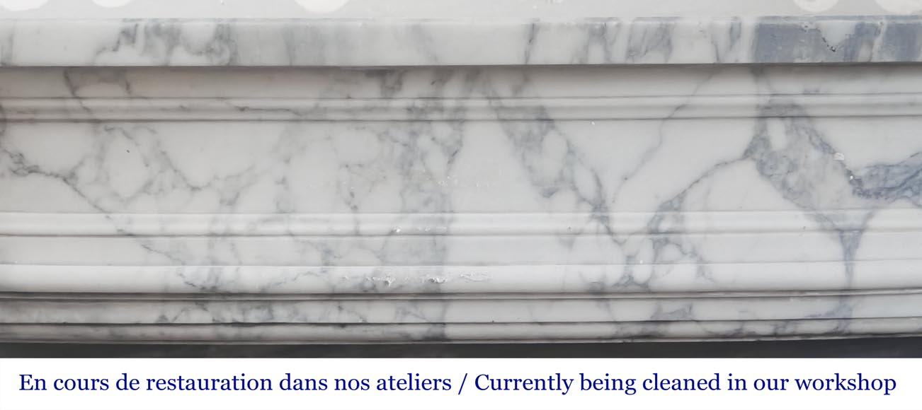 Louis XVI style curved-front fireplace in Arabescato marble, featuring half-columns of the Corinthian order-1