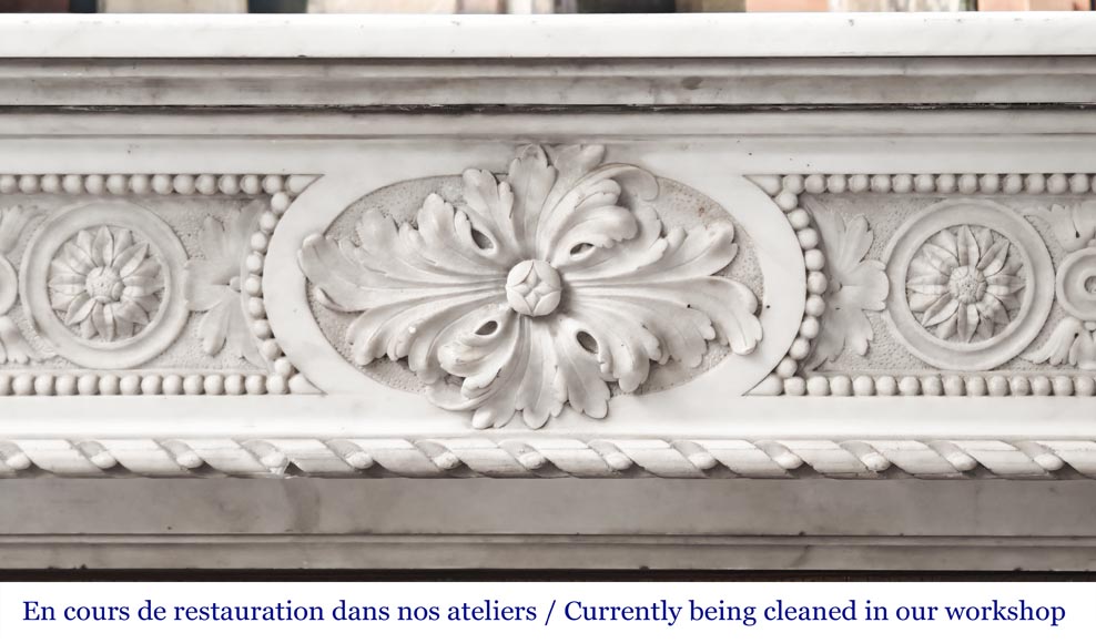 Louis XVI style Carrara marble fireplace with bead and rosette ornamentation Louis XVI style Carrara marble fireplace with bead and rosette ornamentation-1