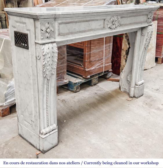 Carrara marble Louis XVI-style fireplace with bead-and-reel ornamentation-3