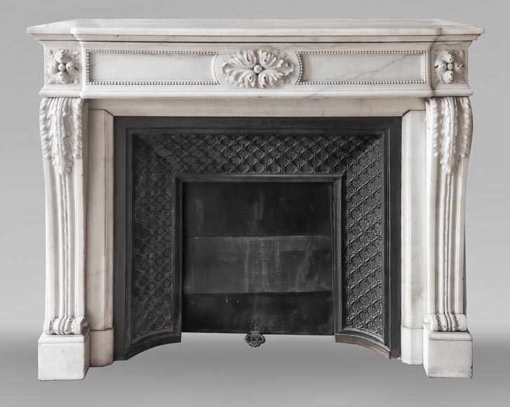 Louis XVI-style statuary marble fireplace featuring acanthus leaf and bead-and-reel motifs Louis XVI-style statuary marble fireplace featuring acanthus leaf and bead-and-reel motifs-0