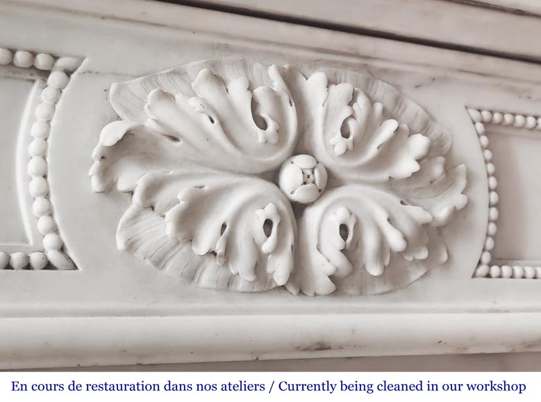 Louis XVI-style statuary marble fireplace featuring acanthus leaf and bead-and-reel motifs Louis XVI-style statuary marble fireplace featuring acanthus leaf and bead-and-reel motifs-2