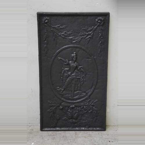 Antique cast iron fireback with a dancer