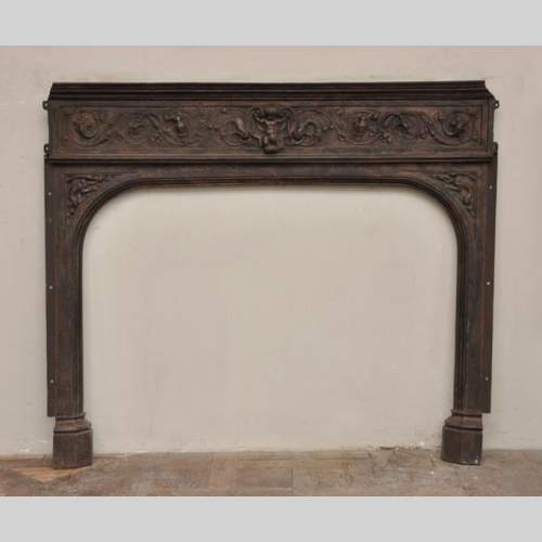 Fireplace cast iron insert, style Napoleon III, with grotesques and chimeras decoration